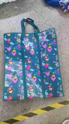 Sacos de compras reutilizáveis, dobráveis, personalizáveis e à prova d'água para compradores ecologicamente corretos